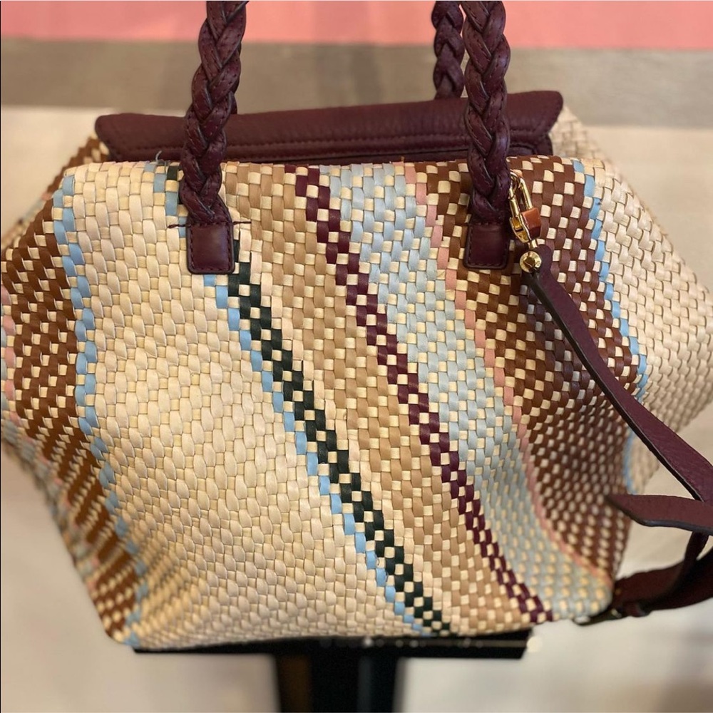 Authentic Tory Burch brown way crescent moon woven leather Handbag.